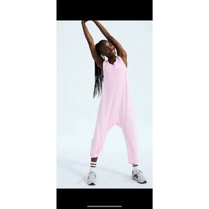 NWOT FP Movement by Free People Hot Shot Twist Back Onesie in Pink Fusion Small